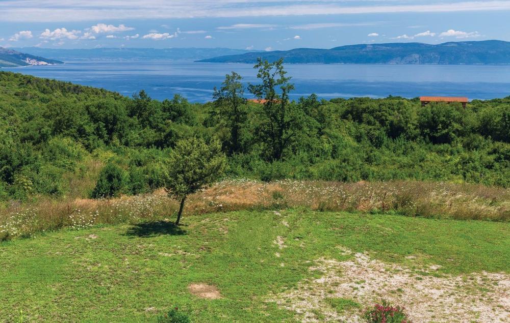 Urban land in Rabac area with sea views 