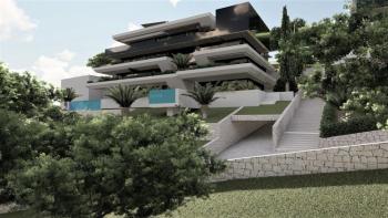 Luxury apartment of 137m2 with private pool in a new building above the center of Opatija, with garage and sea view 