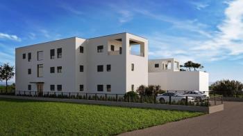 Appartement dans un immeuble moderne à Porec, à 1 km de la mer, à vendre 