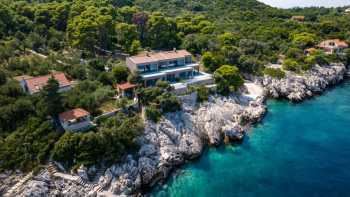 Two modern villas on an isolated island near Dubrovnik which can be united into a single villa with 422 m2 surface and 5656 m2 land plot 