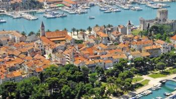 A three story renovated stone house in the historic core of Trogir town 