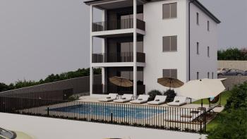 Larger apartment in a new building with a pool and a beautiful sea view in Ika, Opatija, for sale 