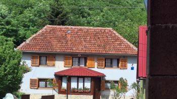 Stone house with a spacious yard in Sinac,Otocac 