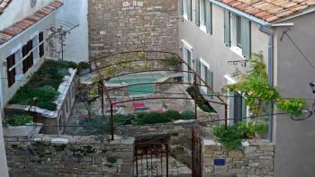 Two stone houses in the old town center of Oprtalj, for sale 