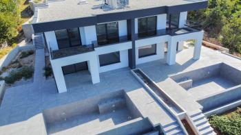 New modern villa with infinity pool, garage, garden, panoramic sea views in Kostrena, for sale 