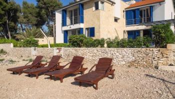 Unique property with two swimming pools first line to the sea in Supetar, island of Brac 