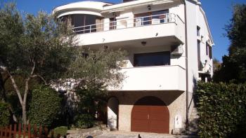 Detached real estate with three apartments just 100 meters from the sea in Krk Town 