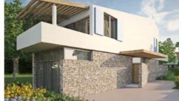 Semi-detached villa under construction in a quiet location within the condo of 40 new villas 