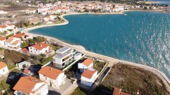 Luxury villa on the first row to the sea in Zadar area, high-tech beauty under construction 