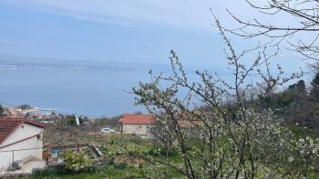 Urban land in Lovran with beautiful sea views 