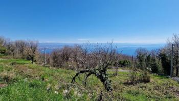 Building plot with sea views in Lovran, Dobrec 