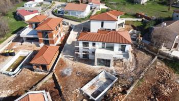 Modern villa with swimming pool under construction in Porec area - two similar villas can be purchased in a package 