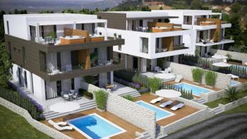 Two bedroom apartment with a swimming pool in an urban villa on Pag peninsula 