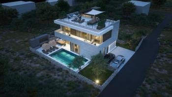 Luxury villa near the sea under construction, 100 meters from the beach 