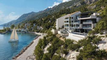 Fantastic modern villa with pool and elevator on the 1st line to the sea in Mimice, Omis riviera 