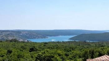 Land with a building permit and a sea view in Rabac area 