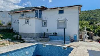 Detached villa with a swimming pool in Brsec, in an oasis of peace with a beautiful view of the sea 