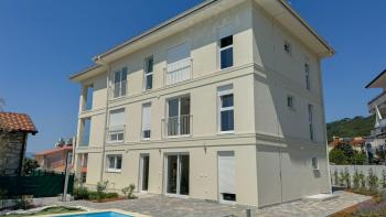 Apartment in a new building with swimming pool, garage, elevator near the sea and Opatija  