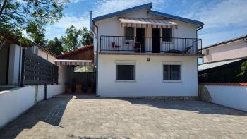 Detached house with 2 apartments in Marcana 