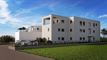 Appartement dans un immeuble moderne à Porec, à 1 km de la mer, à vendre 