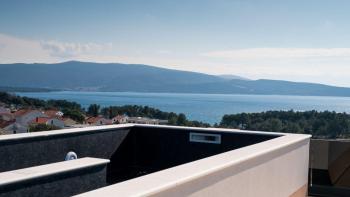 Penthouse de luxe sur deux étages avec toit-terrasse et piscine 