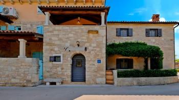 Two stone houses with a swimming pool in Marcana 