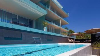 Luxurious apartment in a new building with a pool, view, 150m from the sea in Opatija, for sale 