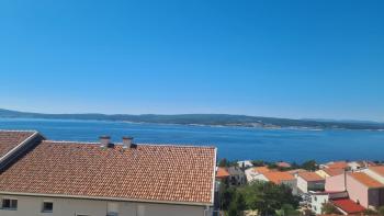 Apartment in a new building with a sea view in Crikvenica, 350m from the sea, for sale 