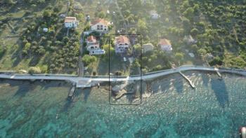 Buy a holiday home in Croatia by the sea in Vodice area, on Prvic island, beachfront with the berth 