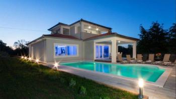 New villa in authentic style with pool and landscaped garden in Labin area 