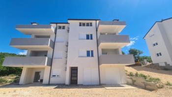 Apartment in a new building with a sea view in Crikvenica 