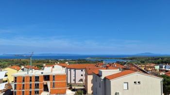 Two-story apartment with a panoramic sea view in Liznjan 