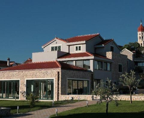 Huge estate of 3000 m2 with two luxury villas just 50 meters from the sea on Murter, Sibenik area 