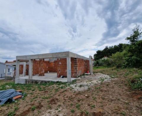 Villa of two parts under construction in Porec suburbs with distant sea views 