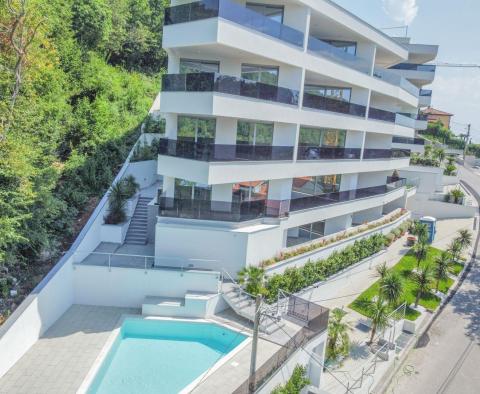Bel appartement dans un immeuble neuf avec vue mer, piscine partagée, garage à Opatija - pic 3