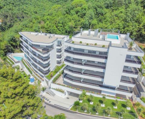 Excellent penthouse dans un immeuble neuf avec vue mer, piscine commune, garage à Opatija ! - pic 2