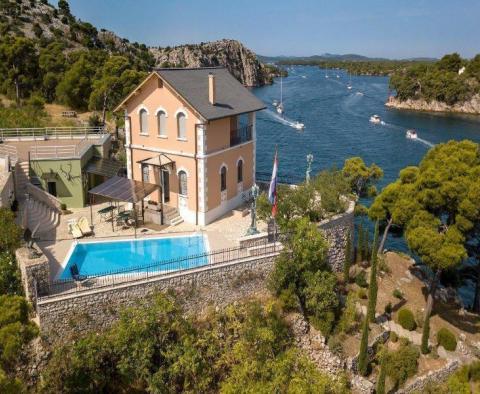 Unique lighthouse-type isolated property with private pier in Sibenik area 