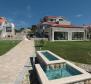 Huge estate of 3000 m2 with two luxury villas just 50 meters from the sea on Murter, Sibenik area - pic 19