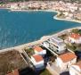 Luxury villa on the first row to the sea in Zadar area, high-tech beauty under construction 