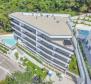 Excellent penthouse dans un immeuble neuf avec vue mer, piscine commune, garage à Opatija ! 