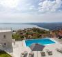 Appartement au rez-de-chaussée avec 3 chambres, vue panoramique sur la mer et piscine 