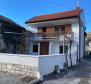 A house with a garage and a large yard in a great location in Rijeka! 