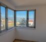 Apartment with a garden in a new building in the center of Opatija with a garage, sea view - pic 6