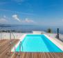 Penthouse in a new building with a rooftop pool above the center of Opatija, idyllic surroundings, for sale 