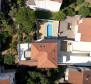 Apart-villa of 5 apartments first row to the sea in Selce 