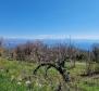 Terrain à bâtir avec vue sur la mer à Lovran, Dobrec 