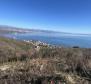 Terrain constructible de 1017 m2 avec vue panoramique sur la mer sur Opatija à Kolavici 